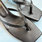 Bare Black Heel
